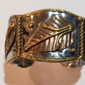 Elegant Gold and Silver Leaf Bracelet